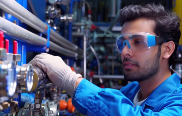 MEP technician conducting pressure testing on plumbing system Dubai building